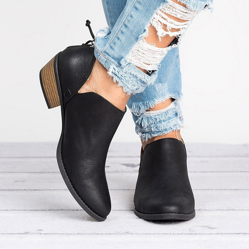Stylish women's ankle boots featuring a comfortable low block heel & convenient back zip. Perfect for casual wear.