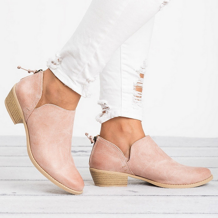 Casual women's block heel ankle boots with a practical back zip. Ideal low heel for everyday fashion & comfort.