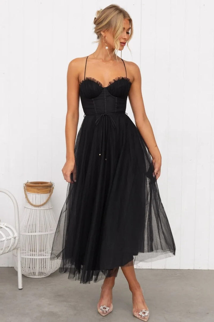 A-line midi wedding guest dress with corset bodice, spaghetti straps & sweetheart neckline. Ideal formal evening wear.