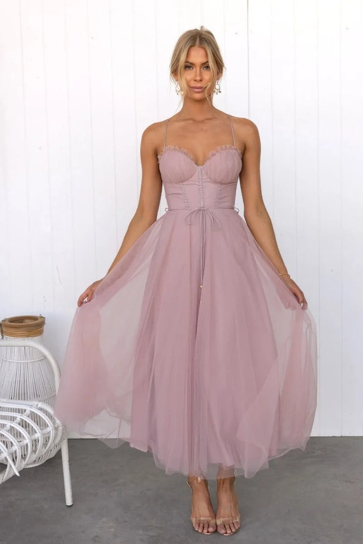 Chic women's midi cocktail dress with corset styling & delicate spaghetti straps for special occasions.
