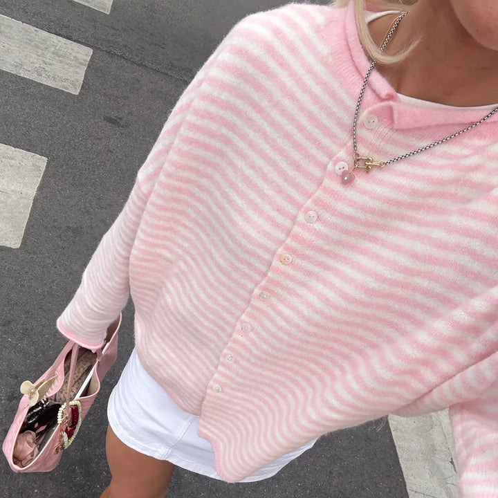 Stylish women's striped sweater cardigan featuring a button-front closure, ideal for fall & spring.